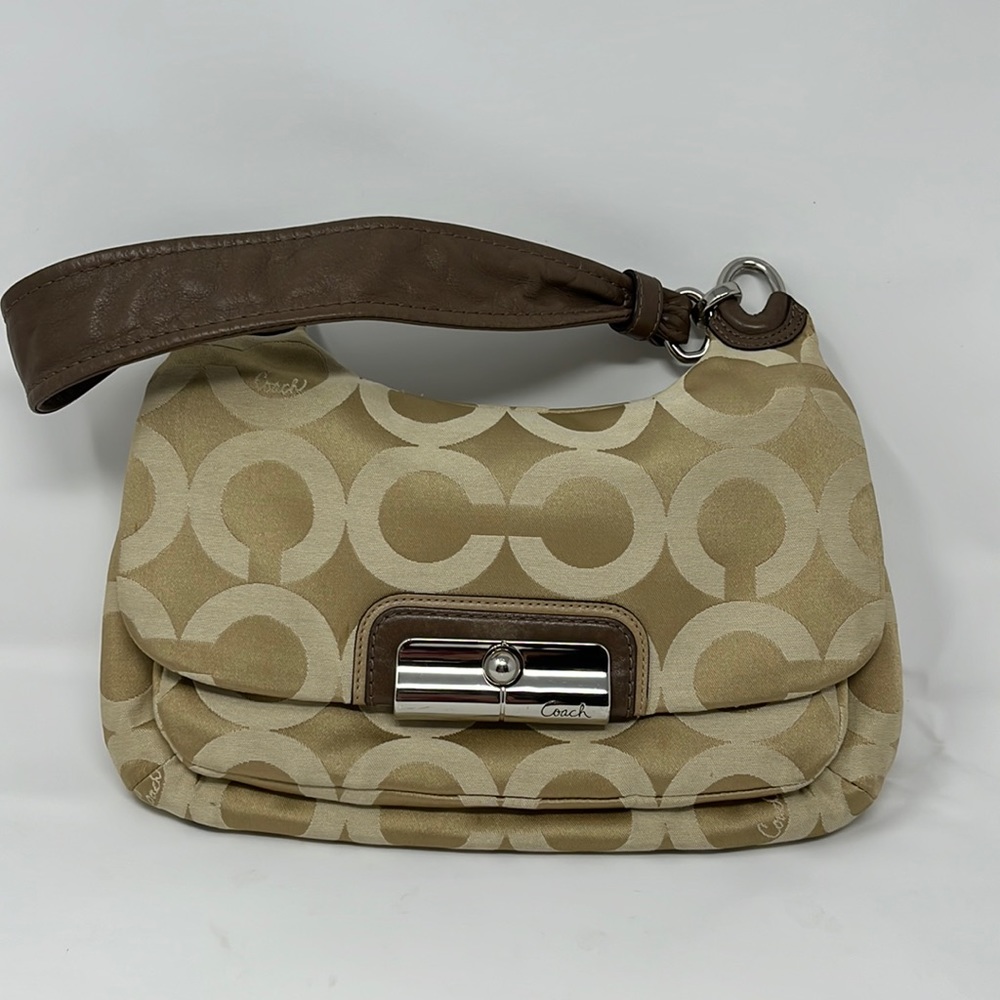 Coach Logo Tan handbag with convertible Purse strap